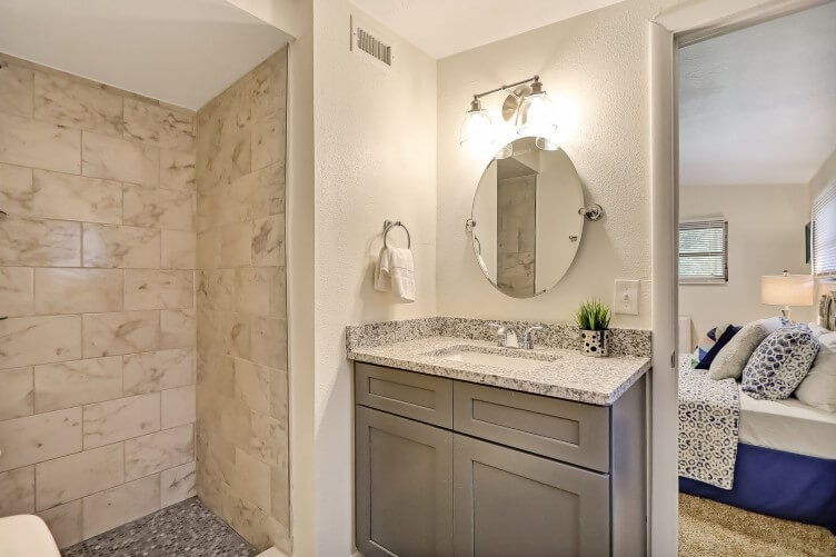 Bathroom renovation with shiplap and chandelier